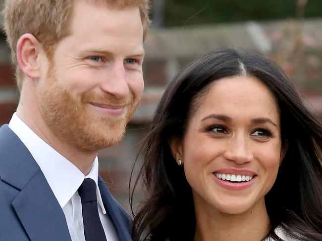 LONDON, ENGLAND - NOVEMBER 27:  Prince Harry and actress Meghan Markle during an official photocall to announce their engagement at The Sunken Gardens at Kensington Palace on November 27, 2017 in London, England.  Prince Harry and Meghan Markle have been a couple officially since November 2016 and are due to marry in Spring 2018.  (Photo by Chris Jackson/Chris Jackson/Getty Images)