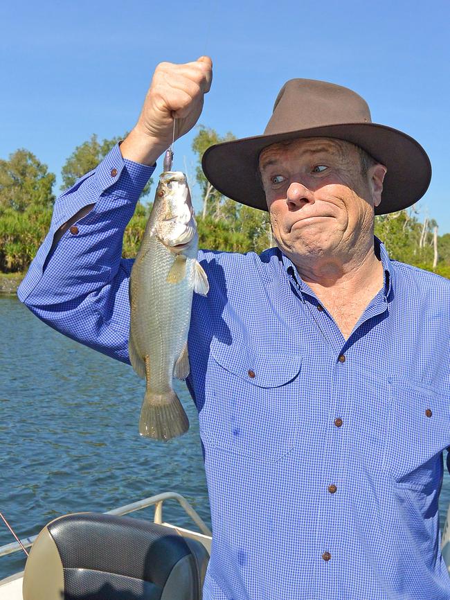 Charles Wooley and his barra, caught at Four Mile Hole in Kakadu. Picture: Supplied