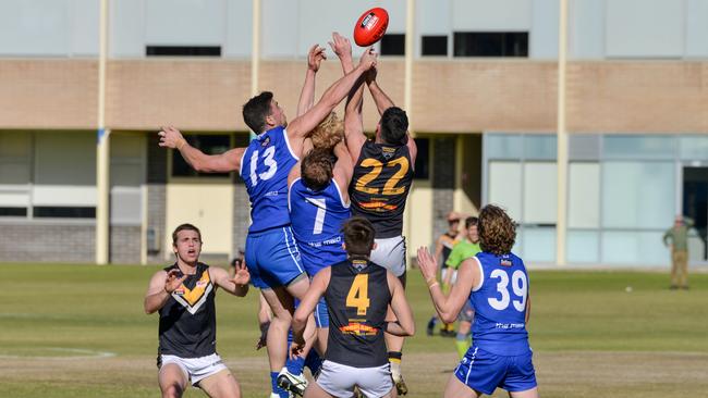 SPOC and Brighton players clash at Caterer Oval on Saturday. Picture: Brenton Edwards