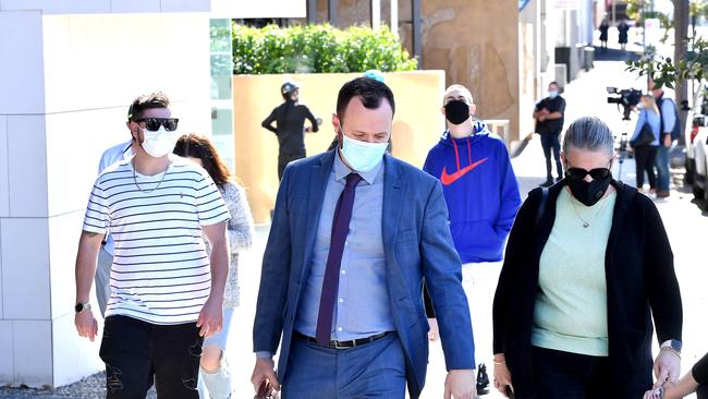 Shane McDowell of Russo lawyers leaves Ipswich court with family and friends of Brayden Wilson-Knight who is charged with murder at Booval. Thursday July 29, 2021. Picture, John Gass