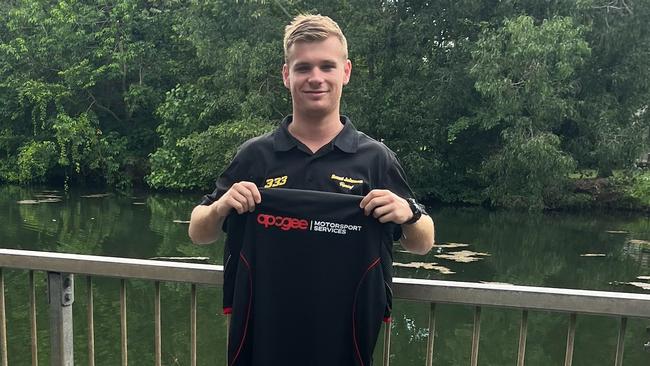 A proud Rossi Johnson holding up his new team polo after receiving a fulltime seat in the 2024 V8 SuperUte Series. Picture: Contributed.