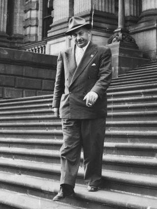 Henry Bolte leaving Parliament House. 