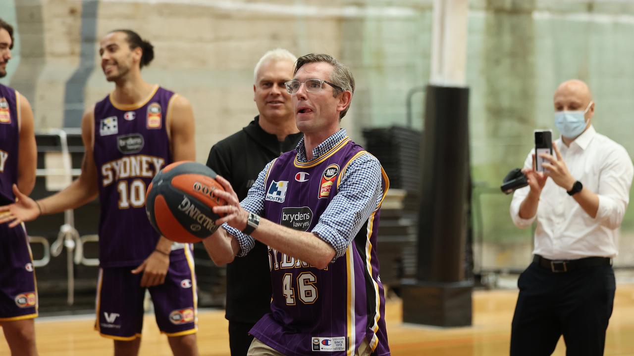 Sydney Kings No. 1 ticket holder Dominic Perrottet struts his stuff on the court. Picture: David Swift