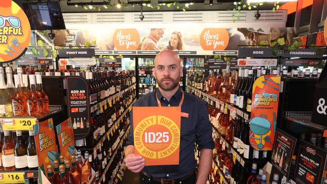 Surfers BWS Store manager Marcus Mlcek ready to check IDs. Picture: Glenn Hampson