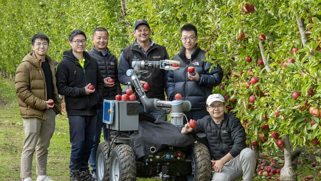 HORTICULTURE: Robot PickingBrad has been involved in a trial of Monash Uni's apple picking robot, which is in its second stage. They're finishing off apple picking this week.PICTURED: L-R Eugene Kok, Wesley Au, Chao Chen, Brad Fankhauser, Tianhao Liu, Hugh Zhou.PICTURE: ZOE PHILLIPS