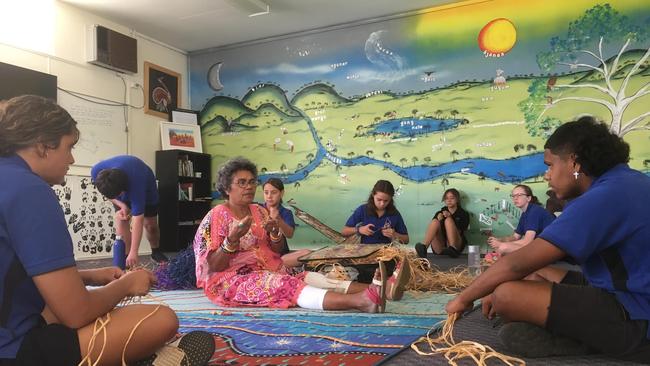 Aunty Kaylene travelled over from Chancellor State College to teach the year 3-10 students of Eidsvold how to weave for NAIDOC week. Photo: Contributed