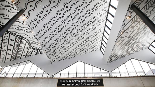 Aboriginal art on the shopping centre’s ceiling depicts the story of the Yarra River. Picture: David Caird