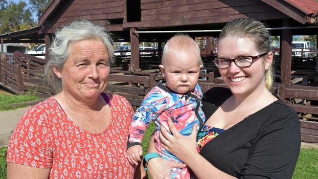 SALE DAY: Former dairy farmer Sandra Kenman was enjoying time with her daughter Lara and grandson Vegas at yesterday's pig and calf sales. Picture: Nicole Zurcas