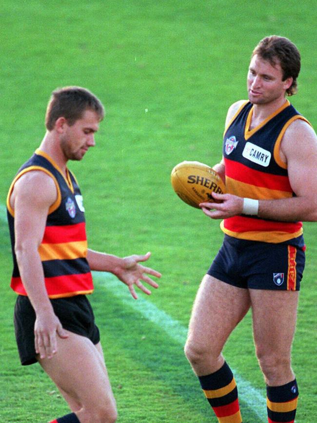 Adelaide Crows star forwards of the early 1990s Tony Modra and Scott Hodges.