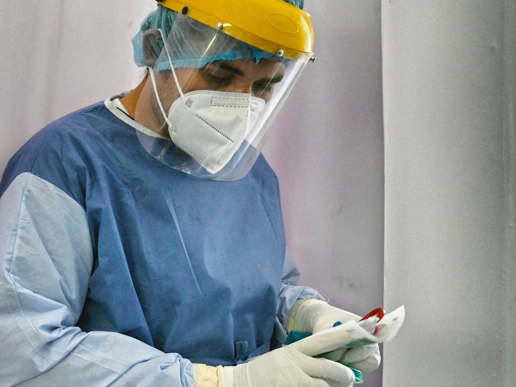 A health worker at the National Defense Secretariat in Mexico City. Picture: ALFREDO ESTRELLA / AFP.