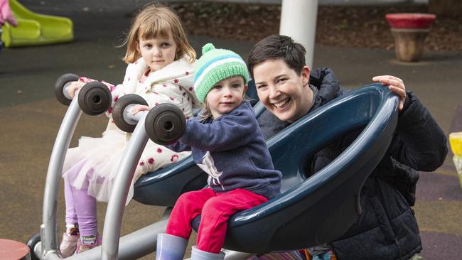 Playing in Queens Park in the cold weather are (from left) cousins Aoife and Neve Fitzgerald with Kate Fitzgerald, Monday, July 15, 2024. Picture: Kevin Farmer