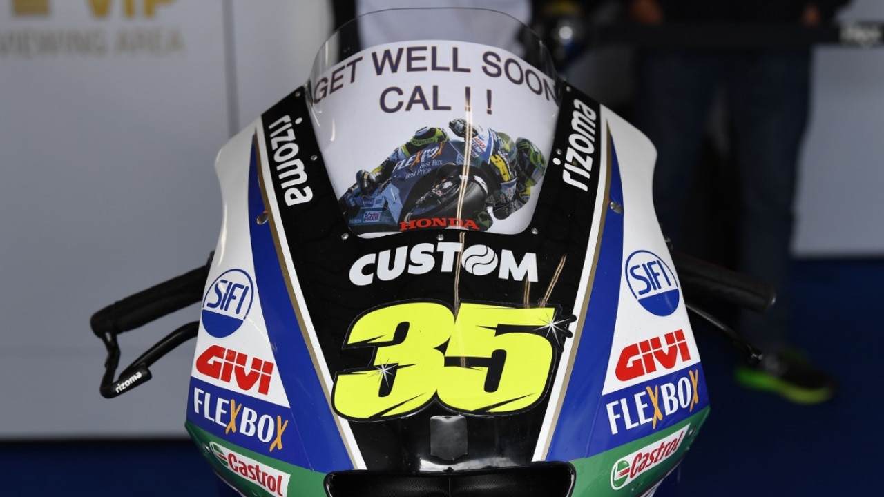 The LCR Honda crew has fitted a 'get well soon' message to Cal Crutchlow's bike at Phillip Island.