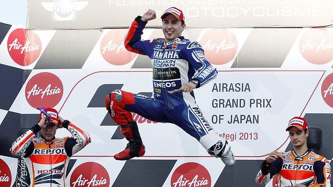 An exuberant Jorge Lorenzo celebrates a crucial win on Honda's home soil.