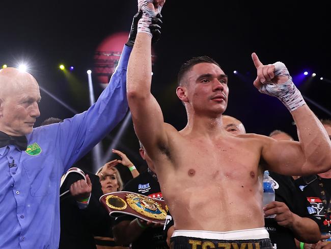 SYDNEY, AUSTRALIA - NOVEMBER 17:   Tim Tszyu celebrates winning the WBO Global and Asia Pacific Super Welterweight title bout between Tim Tszyu of Australia and Takeshi Inoue of Japan at Qudos Bank Arena on November 17, 2021 in Sydney, Australia. (Photo by Mark Kolbe/Getty Images)