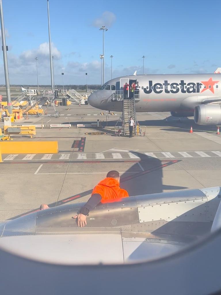 The man climbed down from the plane via the engine. Picture: James Gordon/X