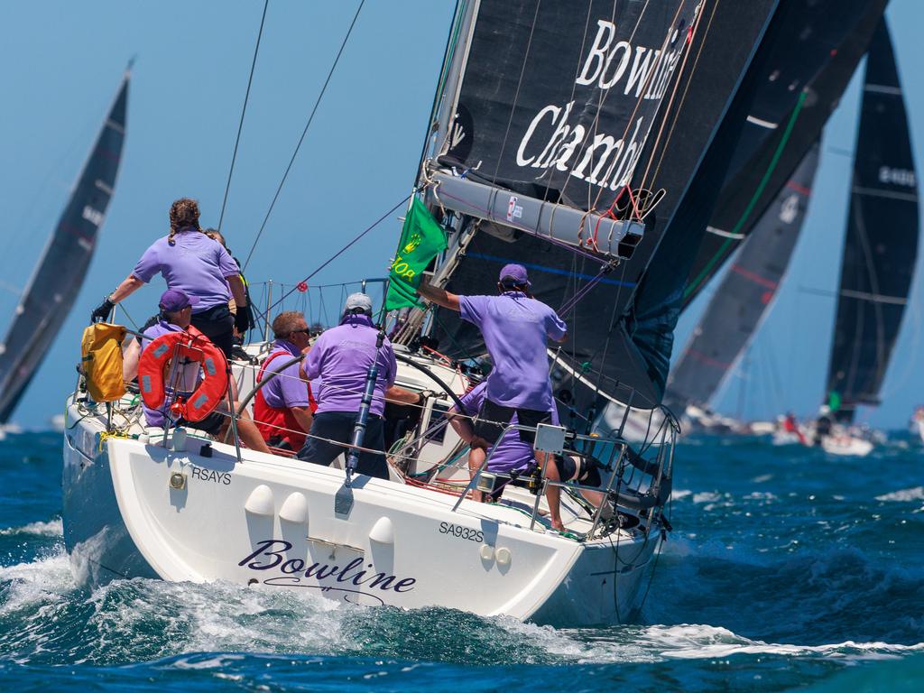 Bowline passes between Sydney Harbour’s North and South Head at the start of the race. Picture: Justin Lloyd