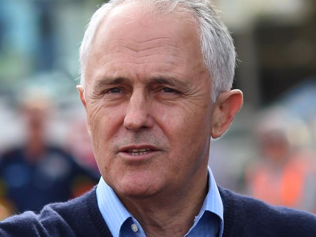 Australian Prime Minister Malcolm Turnbull speaks to the media after visiting flood affected areas in the NSW town of Picton south of Sydney, Tuesday, June 7, 2016. Turnbull is meeting flood victims in NSW, which was lashed by fearsome storms over the weekend.(AAP Image/Lukas Coch) NO ARCHIVING