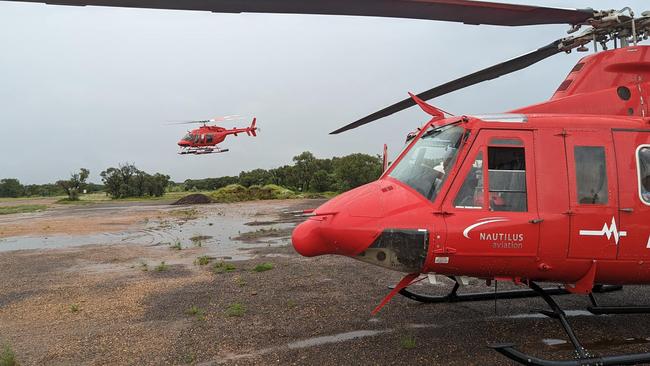 Two of the Nautilus Aviation fleet at work as Emergency Service Co-ordinator Tim Borresen said urgent supplies are being delivered to flooded and isolated stations and communities. Picture: Supplied