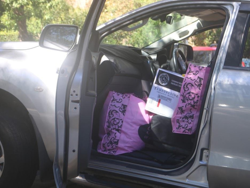 Mr Lehrmann’s belongings being packed into a ute outside the house of his friend where he was temporarily staying. Picture: news.com.au