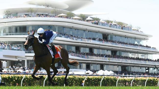 Jamie Kah guides The Map to a dominant win at Flemington on Melbourne Cup day. Picture: Quinn Rooney-Getty Images