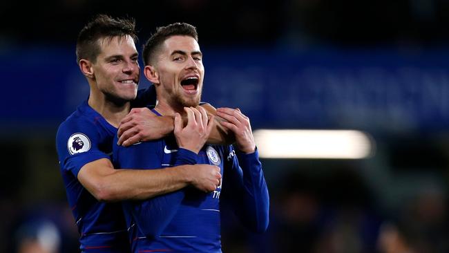 Cesar Azpilicueta and Jorginho celebrate together after the win.