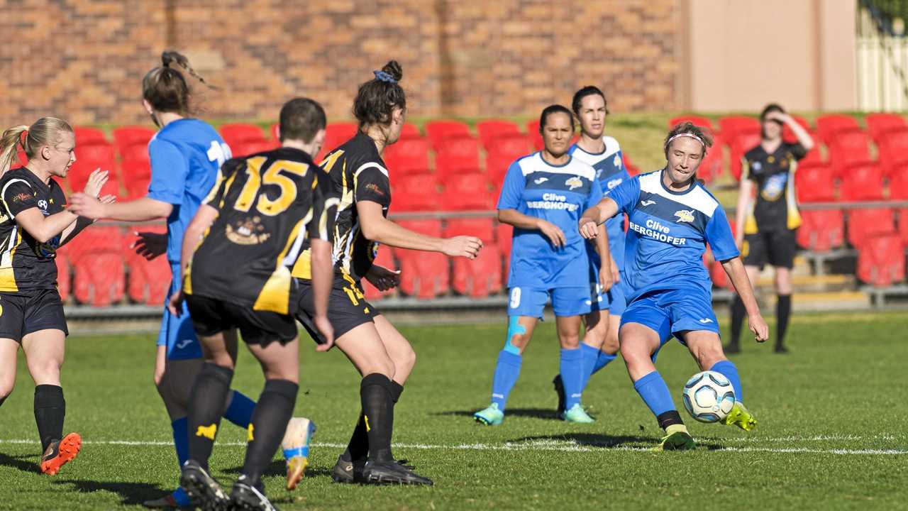 ON TARGET: Chloe Hutton scores for the South West Queensland Thunder in the NPLWQ game against Mudgeeraba last season. Hutton featured in the Thunder's senior squad after an excellent run of form in the juniors. Picture: Kevin Farmer