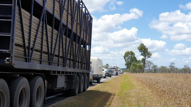 Traffic on the Wide Bay Highway is at a standstill as emergency crews work to help three people seriously injured in a two car accident.