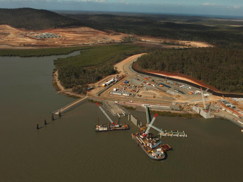 Aerial view of Gladstone Harbour, Queensland, in the World Heritage listed area where the nation's biggest dredging operation is underway as part of the $30 billion Curtis Island LNG project. where 2000 hectares of seagrass has been reclaimed for dumping the excess sand. Local fish and marine life is dying and appearing with red lesions and rashes, allegedly from the disturbance of sediment or virus with the dredging. The harbour already has a coal port, aluminium smelter, cyanide factory, power station, bauxite port, shale oil plant and the largest cement works in Australia all in a declared World Heritage Zone 40 kms from the Great Barrier Reef.