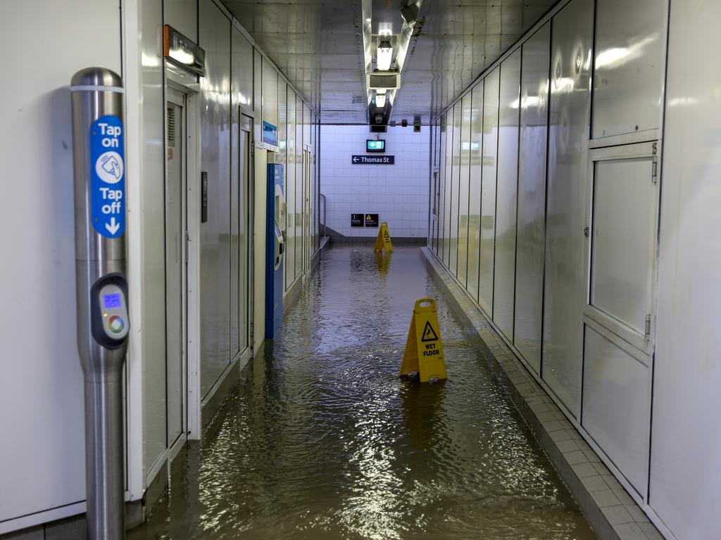 Commuters struggle against torrential rain and gale force winds in Lewisham as Sydney is lashed with a monumental early summer storm, 28/11/18. Picture: Nicholas Eagar