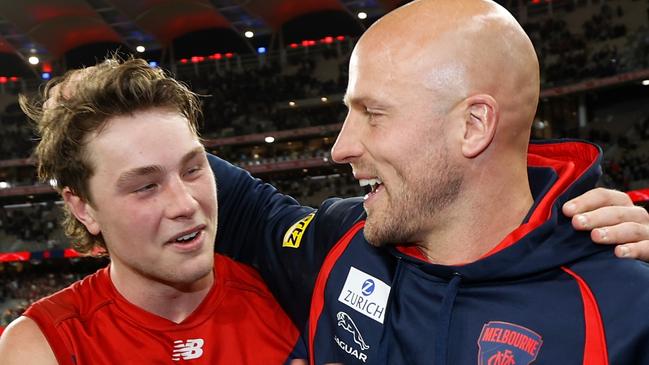 Tom Sparrow (left) and Nathan Jones after Melbourne’s preliminary final win. Picture: Michael Willson / AFL Photos via Getty Images