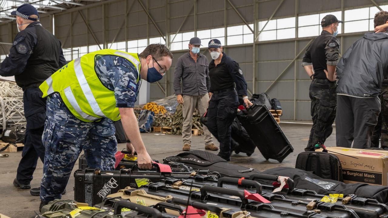 Australian Federal Police AFP Special Operations members prepare to depart Canberra, ACT, for the Solomon Islands.