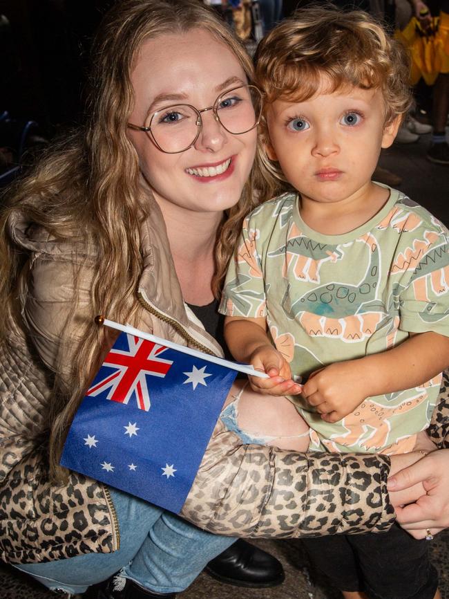 Thousands of people have braved the rain to gather in Brisbane for Anzac Day services. Picture: Grace Kessels