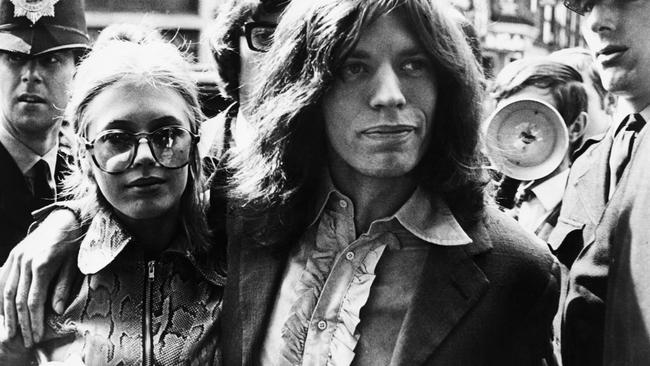 Mick Jagger and Marianne Faithfull, arrive at the London Magistrate's Court to face charges of possessing marijuana.