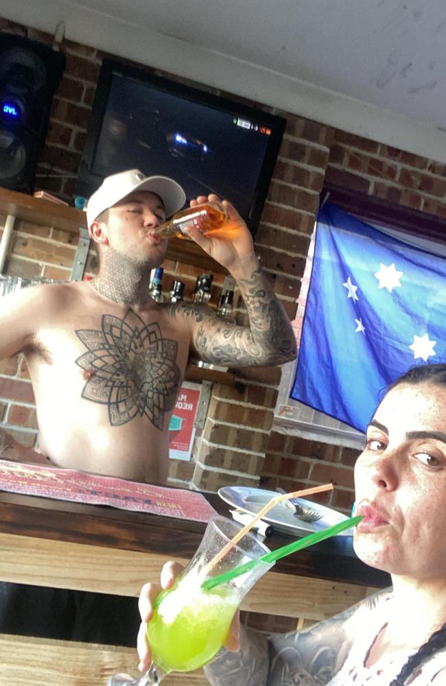 Daniel and Kaylyn Rule, 24, from western Sydney, knocking back a few bevvies in their makeshift pub. Picture: TikTok/kaylyn.mitchell