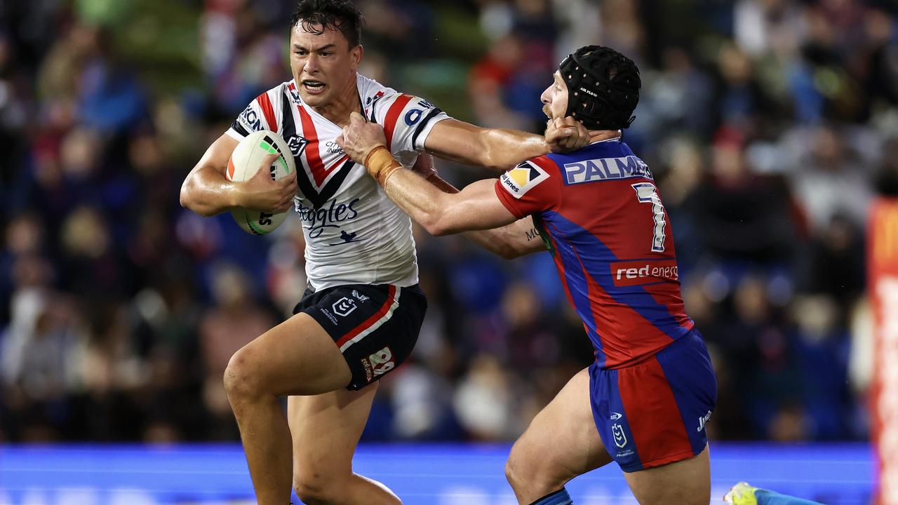 NEWCASTLE, AUSTRALIA - APRIL 11: JosephÃ&#130;Â Manu of the Roosters is tackled during the round six NRL match between Newcastle Knights and Sydney Roosters at McDonald Jones Stadium, on April 11, 2024, in Newcastle, Australia. (Photo by Cameron Spencer/Getty Images)