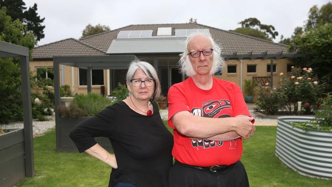 De facto couple Glenda MacNaughton and Patrick Hughes at their Wyndham St home of 11 years, which will be demolished to make way for drainage and some open space. Picture: Peter Ristevski