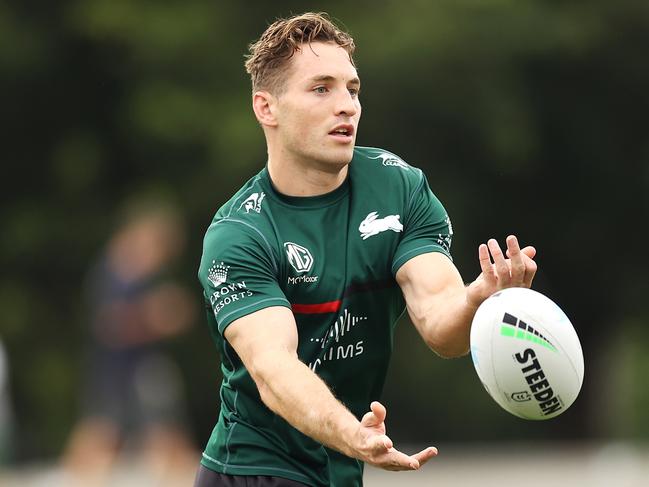 SYDNEY, AUSTRALIA - MARCH 21: Cameron Murray passes during a South Sydney Rabbitohs NRL training session at Redfern Oval on March 21, 2022 in Sydney, Australia. (Photo by Mark Kolbe/Getty Images)