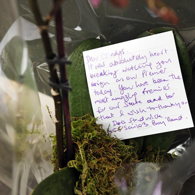 Pictured is a message on flowers left by a supporter of outgoing NSW Premier Gladys Berejiklian at her Northbridge home. Picture: Richard Dobson