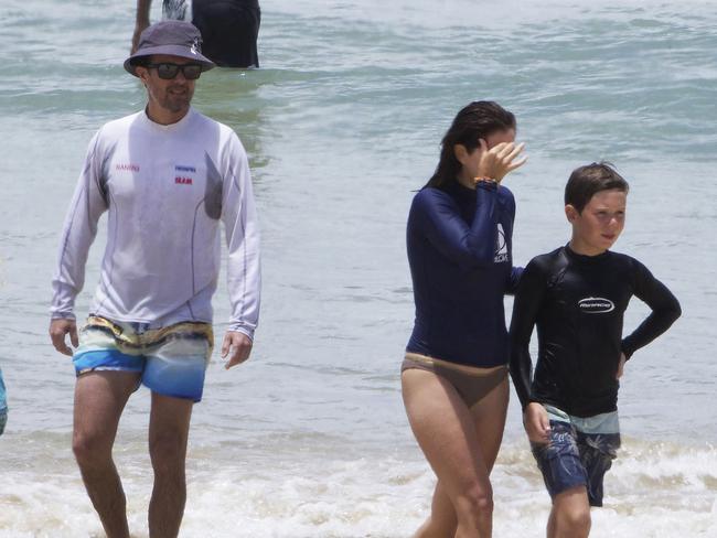 Prince Frederik, Princess Mary &amp; Prince Christian emerge from the water. Picture: INF