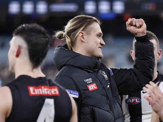 MELBOURNE, AUSTRALIA - AUGUST 11: Darcy Moore of the Magpies acknowledges the fans after the round 22 AFL match between Collingwood Magpies and Geelong Cats at Melbourne Cricket Ground, on August 11, 2023, in Melbourne, Australia. (Photo by Darrian Traynor/Getty Images)