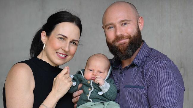 Sunshine Coast Councillor Christian and Samantha Dickson, with their young son Theodore. Picture: Patrick Woods.