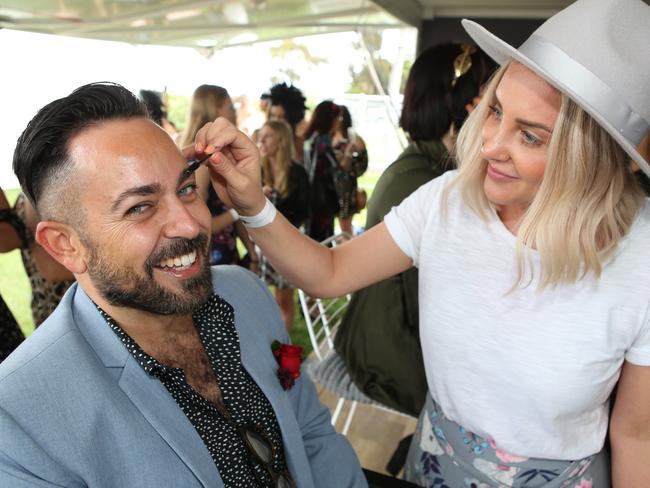 Tezer Husey getting made up by Rebecca Vivian. Picture: Glenn Ferguson