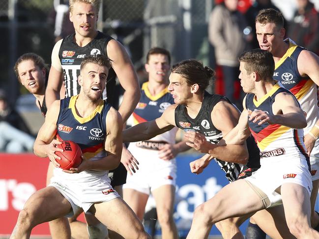 SANFL - Port Adelaide v Adelaide at Alberton Oval. Jordan Gallucci under pressure. Picture Sarah Reed