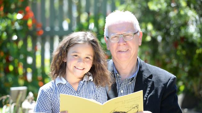 Together with her grandpa, Noel Stonehouse, Grade 2 student Sierra has written a book which has been published. The book is called "Sierra Goes Hunting for Lamingtons" and takes Sierra around the sights of Melbourne before she is successful in her quest to find the world's biggest lamington. Picture: Lawrence Pinder