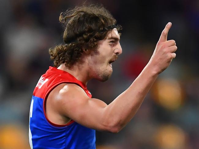 BRISBANE, AUSTRALIA - AUGUST 19: Luke Jackson of the Demons celebrates kicking a goal during the round 23 AFL match between the Brisbane Lions and the Melbourne Demons at The Gabba on August 19, 2022 in Brisbane, Australia. (Photo by Albert Perez/AFL Photos via Getty Images)