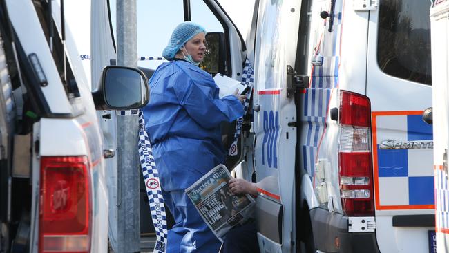 Detectives at the Highland Park home were Ivona Jovanovic was shot. Picture: Glenn Hampson