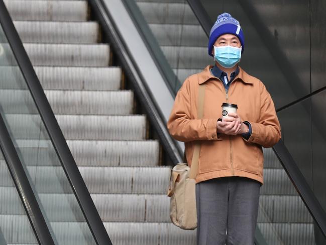 Mandatory face mask wearing came into force overnight as infections grew by another 300. David Crosling/NCA NewsWire