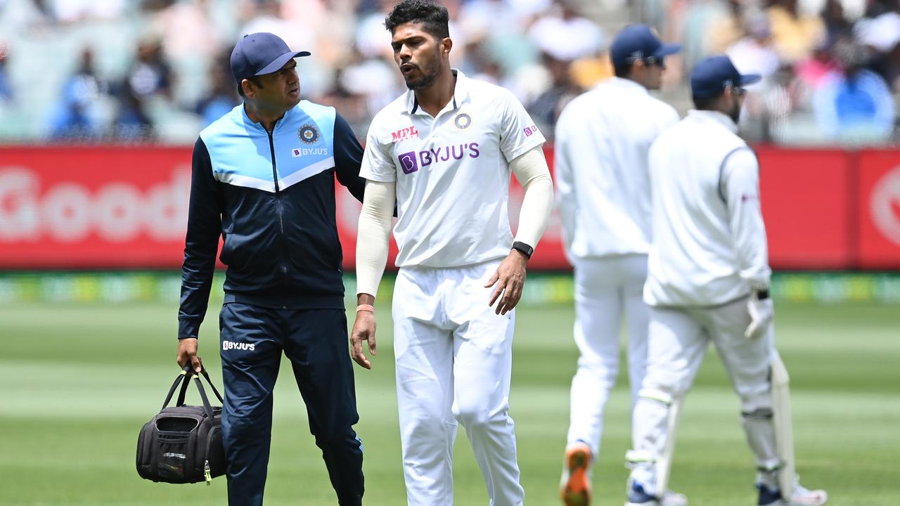 Umesh Yadav of India leaves the field injured. (Photo by Quinn Rooney/Getty Images)