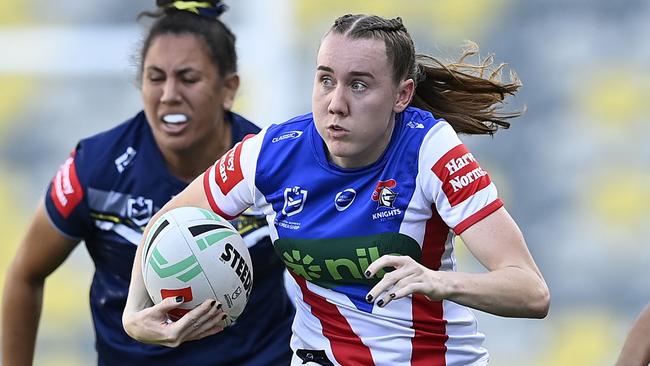 TOWNSVILLE, AUSTRALIA - SEPTEMBER 21: Tamika Upton of the Knights makes a break during the round nine NRLW match between North Queensland Cowboys and Newcastle Knights at Queensland Country Bank Stadium on September 21, 2024 in Townsville, Australia. (Photo by Ian Hitchcock/Getty Images)