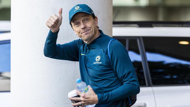 Matildas coach Tony Gustavsson gives the thumbs up as the team leaves their Brisbane hotel.